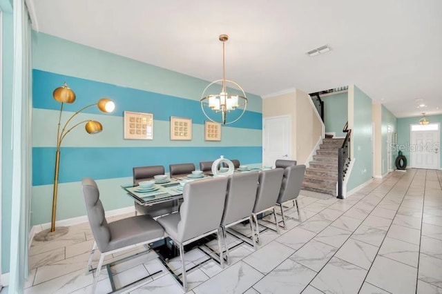 dining area with light tile flooring and an inviting chandelier