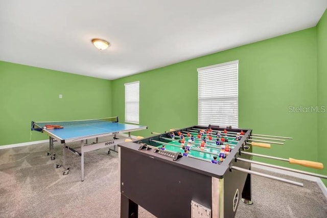 game room featuring a healthy amount of sunlight and carpet