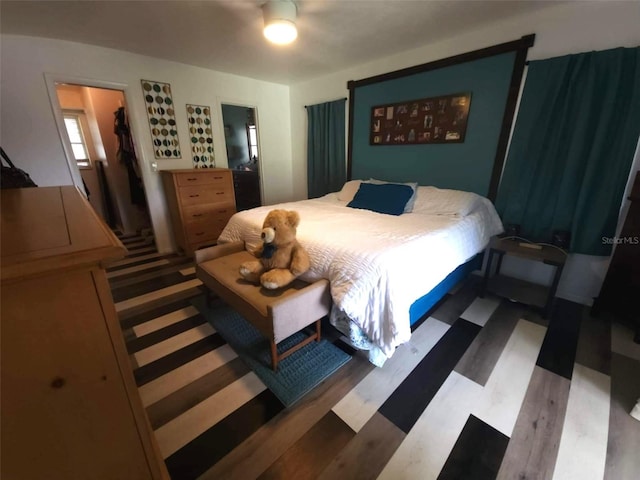 bedroom featuring hardwood / wood-style flooring