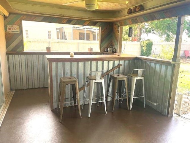 bar featuring plenty of natural light