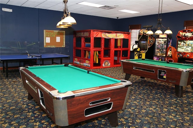 recreation room with dark carpet, a paneled ceiling, and billiards