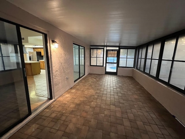 view of unfurnished sunroom