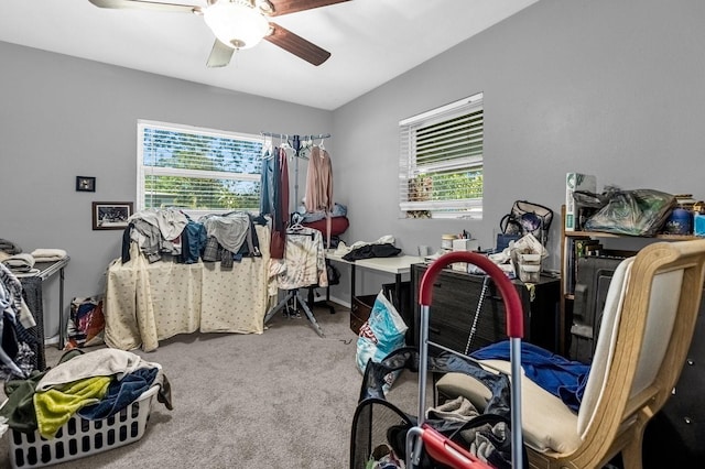 carpeted bedroom featuring ceiling fan