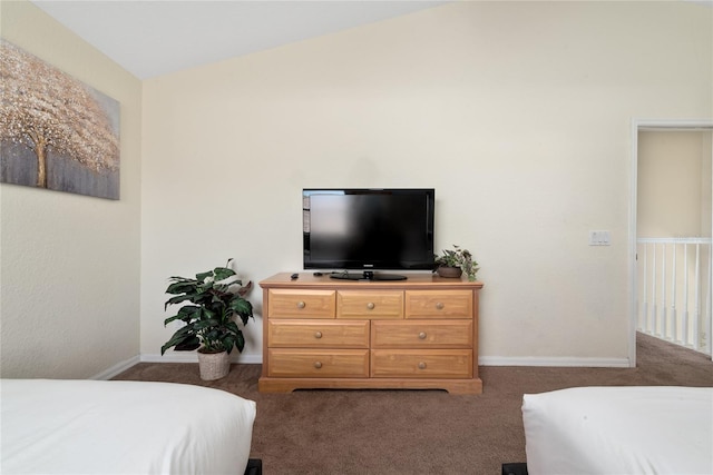 carpeted bedroom featuring vaulted ceiling