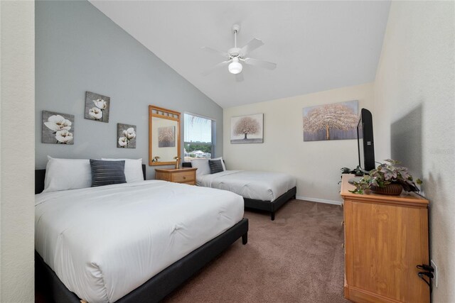 carpeted bedroom featuring high vaulted ceiling and ceiling fan