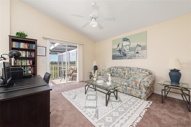 living room with carpet, ceiling fan, and vaulted ceiling