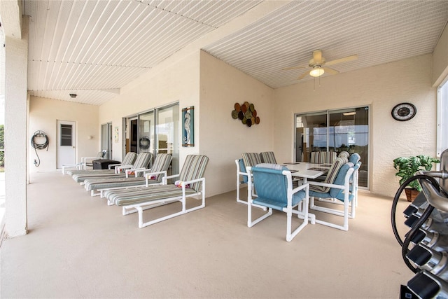 view of terrace featuring ceiling fan