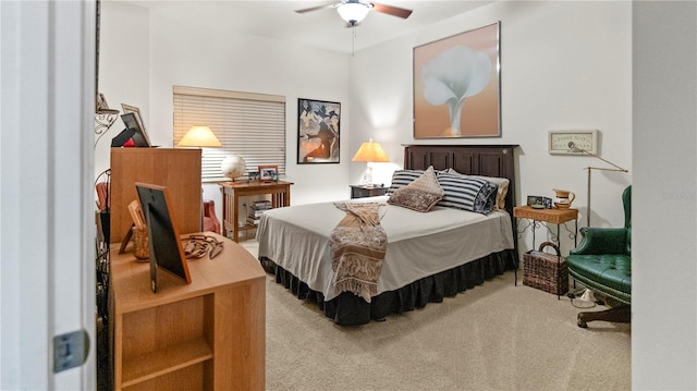 bedroom with ceiling fan and carpet