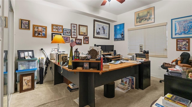 office featuring ceiling fan and light colored carpet