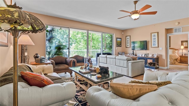 living room with ceiling fan