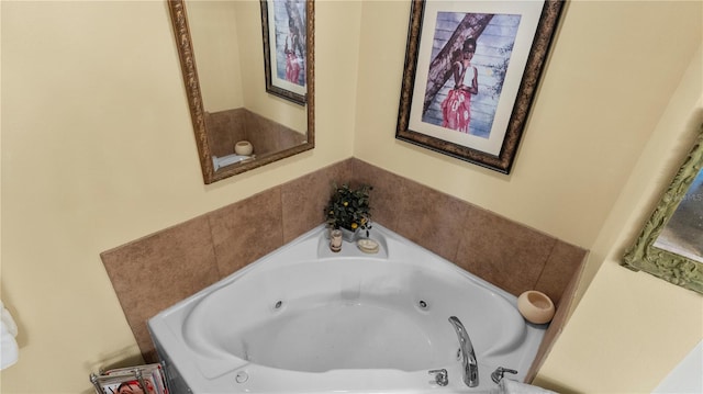 bathroom featuring a tub to relax in