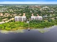 drone / aerial view with a water view