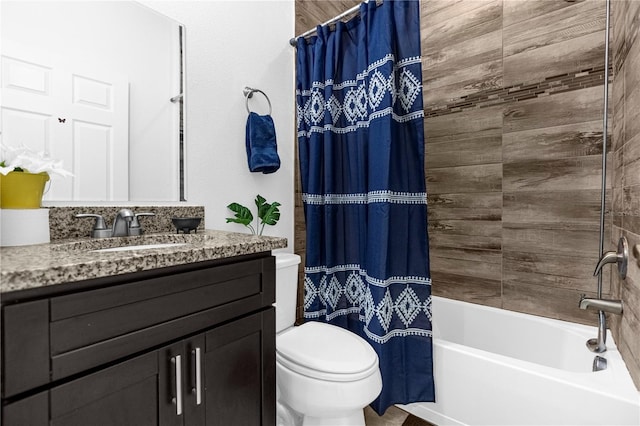 full bathroom featuring vanity, toilet, and shower / bath combo with shower curtain