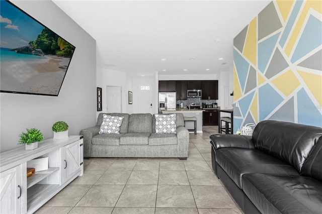 living room featuring light tile patterned flooring