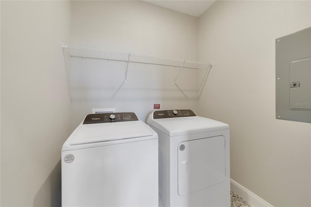 washroom with washer and dryer