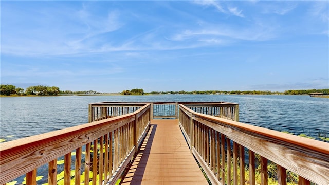 dock area featuring a water view