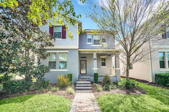 view of front of home featuring covered porch