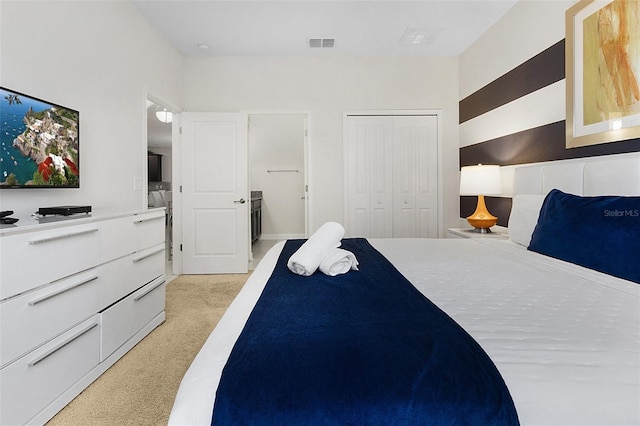 carpeted bedroom with a closet