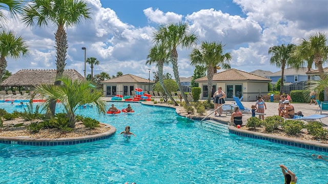 view of swimming pool with a patio