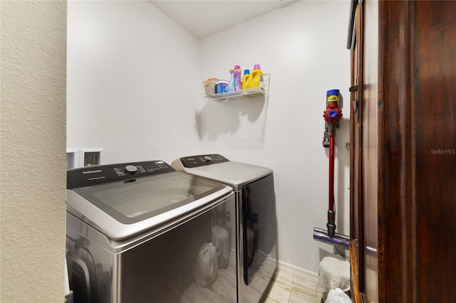 laundry area with independent washer and dryer and hookup for a washing machine