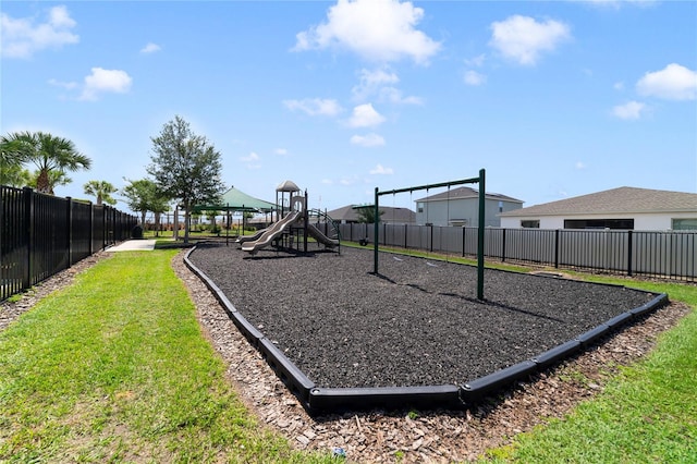 view of playground with a yard