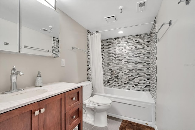 full bathroom with tile floors, vanity, shower / bath combo, and toilet