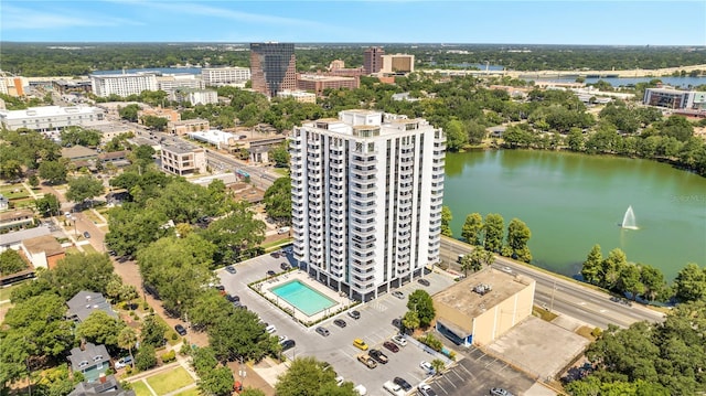 birds eye view of property with a water view