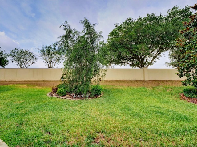 view of yard with fence