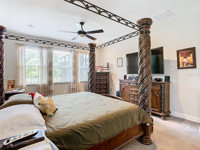 bedroom with ceiling fan and carpet flooring