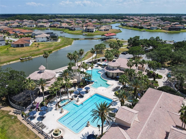 birds eye view of property featuring a water view