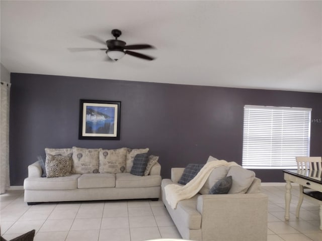 tiled living room featuring ceiling fan