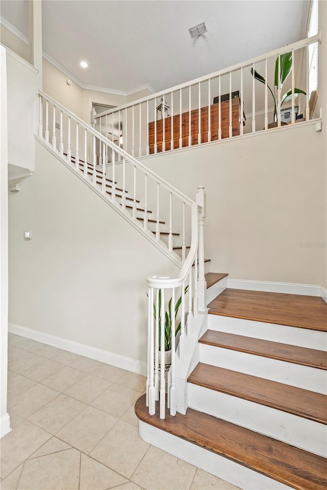 staircase with tile floors