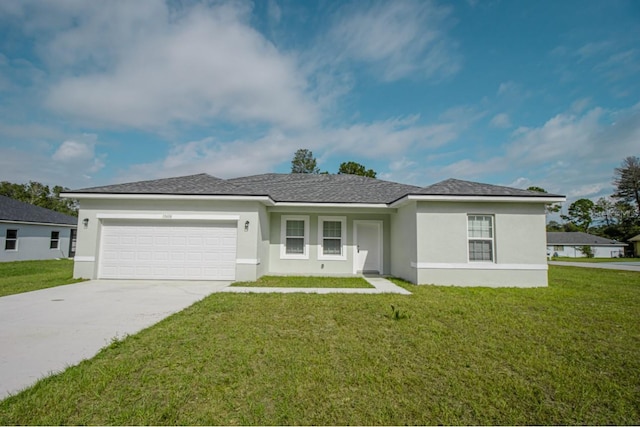 single story home with a front yard and a garage