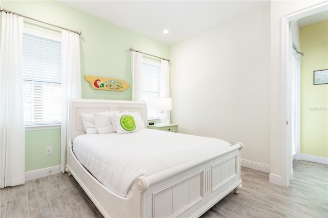 bedroom featuring light wood-type flooring