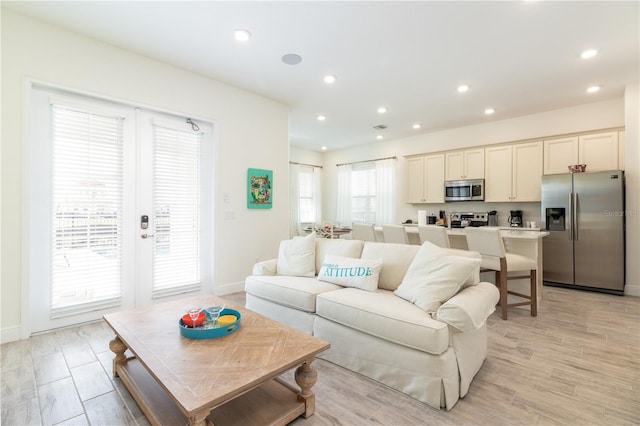 living room featuring light wood-type flooring