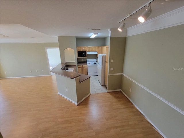 kitchen featuring kitchen peninsula, rail lighting, ornamental molding, white electric range oven, and light hardwood / wood-style flooring