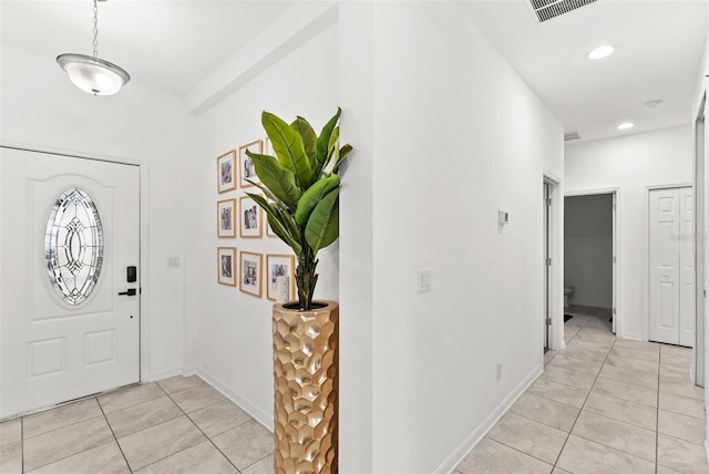 view of tiled entrance foyer