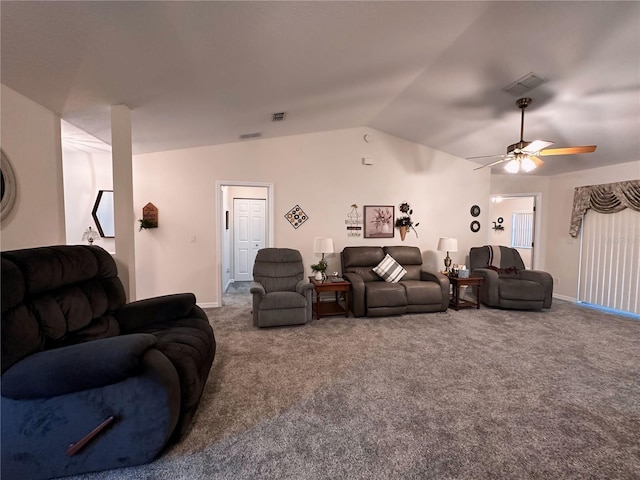 living room with vaulted ceiling, ceiling fan, and carpet floors