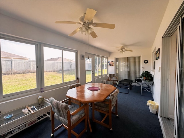 sunroom / solarium with french doors and ceiling fan