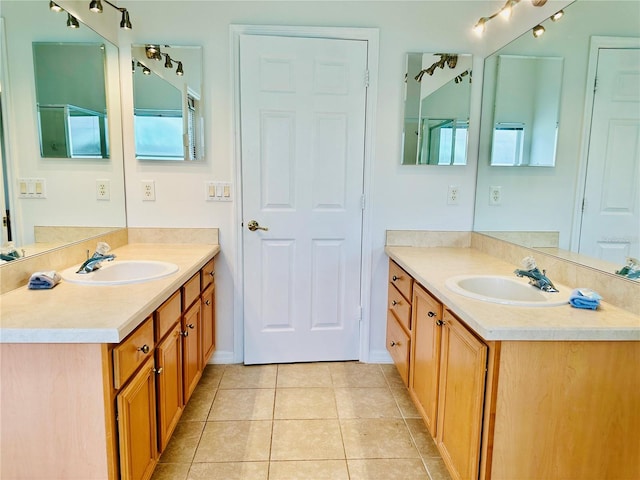 bathroom with vanity and tile patterned floors