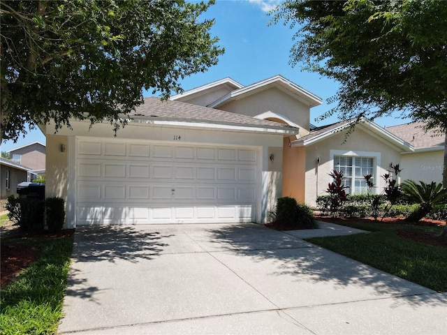 single story home with a garage