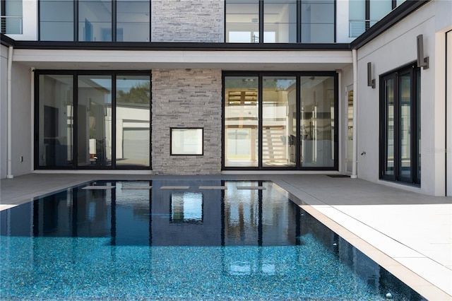 view of pool with a patio area