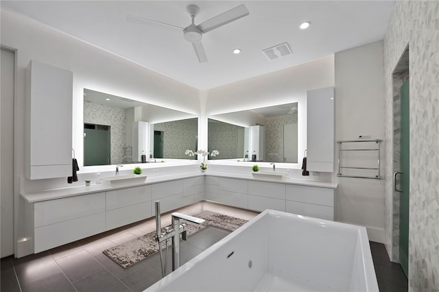 bathroom with tile patterned flooring, vanity, separate shower and tub, and ceiling fan