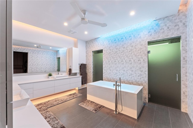 bathroom with tile patterned flooring, vanity, ceiling fan, and independent shower and bath