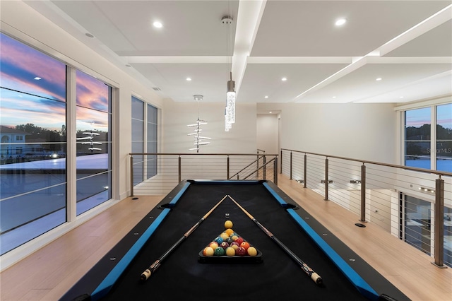 playroom with beamed ceiling, wood-type flooring, and pool table