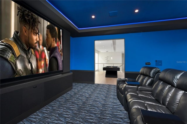 cinema room featuring wood-type flooring