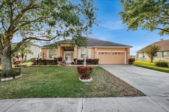 ranch-style house with a garage and a front lawn