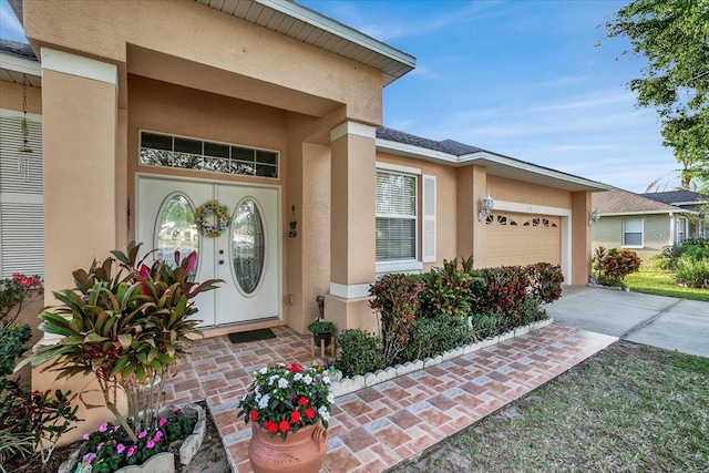 entrance to property featuring a garage