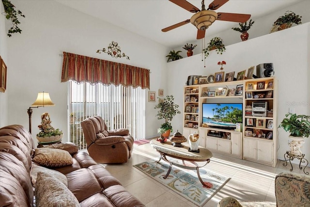 tiled living room featuring ceiling fan