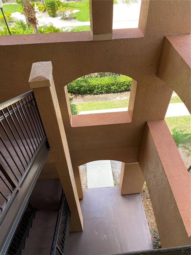 interior space with a balcony